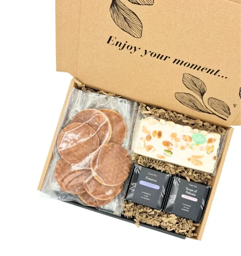 Confezione regalo con waffle, torrone e tè